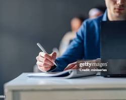 Hình ảnh về Students taking computer exam in a classroom setting