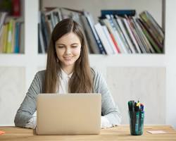 Hình ảnh về Students studying online using laptops at home